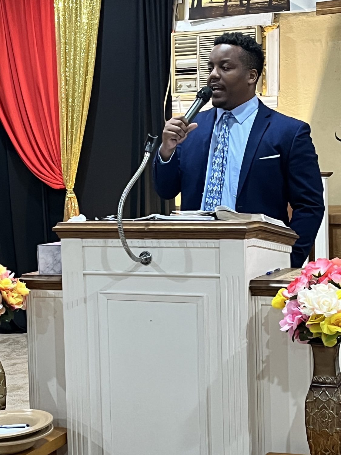 Pastor A. J. Ballenger preaching at New Zion